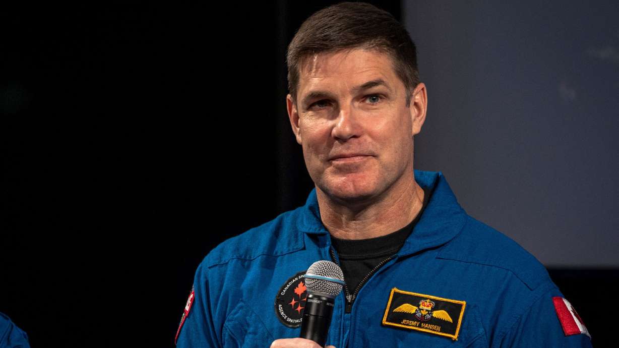 Canadian astronaut Jeremy Hansen, mission specialist for Artemis II, speaks at the Canadian Space Agency headquarters in May. Hansen said Monday that he is stepping back from a full-time astronaut role in September.