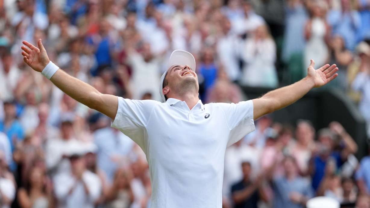 Arthur Fery of Britain celebrates winning the men's singles fourth round match against Grigor Dimitrov of Bulgaria at the Wimbledon Tennis Championships in London, Monday, July 6, 2026.