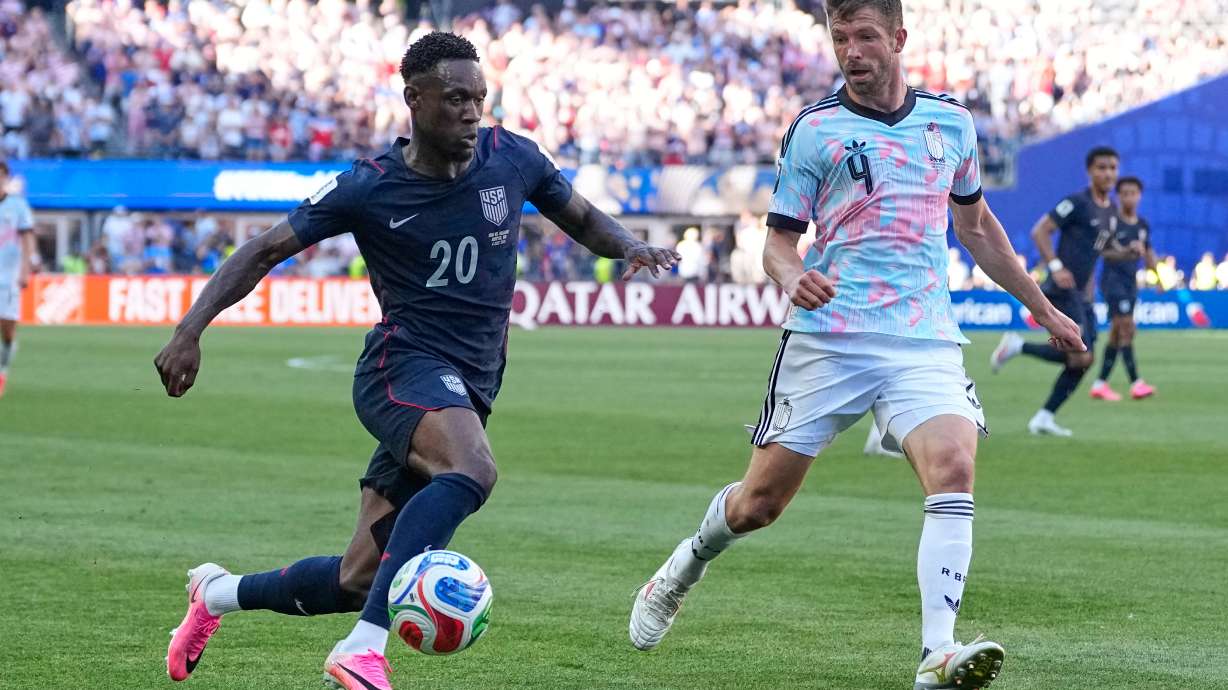 United States' Folarin Balogun (20) and Belgium's Brandon Mechele (4) battle for the ball during the World Cup round of 16 soccer match between the United States and Belgium in Seattle, Monday, July 6, 2026.