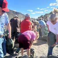 Eureka residents fill sandbags to prepare for potential flooding after fires