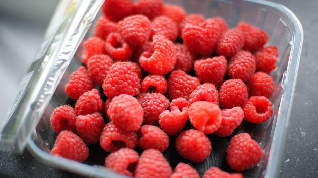 In a study, diligent washing removed most, but not all, of the cyclospora eggs on raspberries.