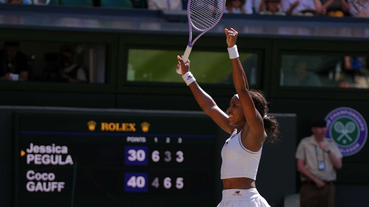 Coco Gauff of the United States celebrates winning the women's singles quarter-final match against Jessica Pegula of the United States at the Wimbledon Tennis Championships in London, Tuesday, July 7, 2026.