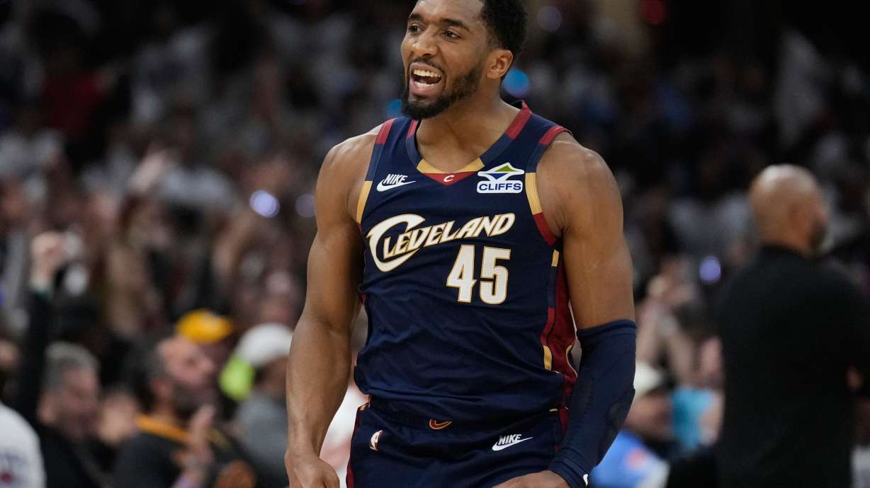 FILE - Cleveland Cavaliers' Donovan Mitchell (45) gestures after hitting a three-point basket inthe second half of Game 4 of a second-round NBA basketball playoff series against the Detroit Pistons, May 11, 2026, in Cleveland.
