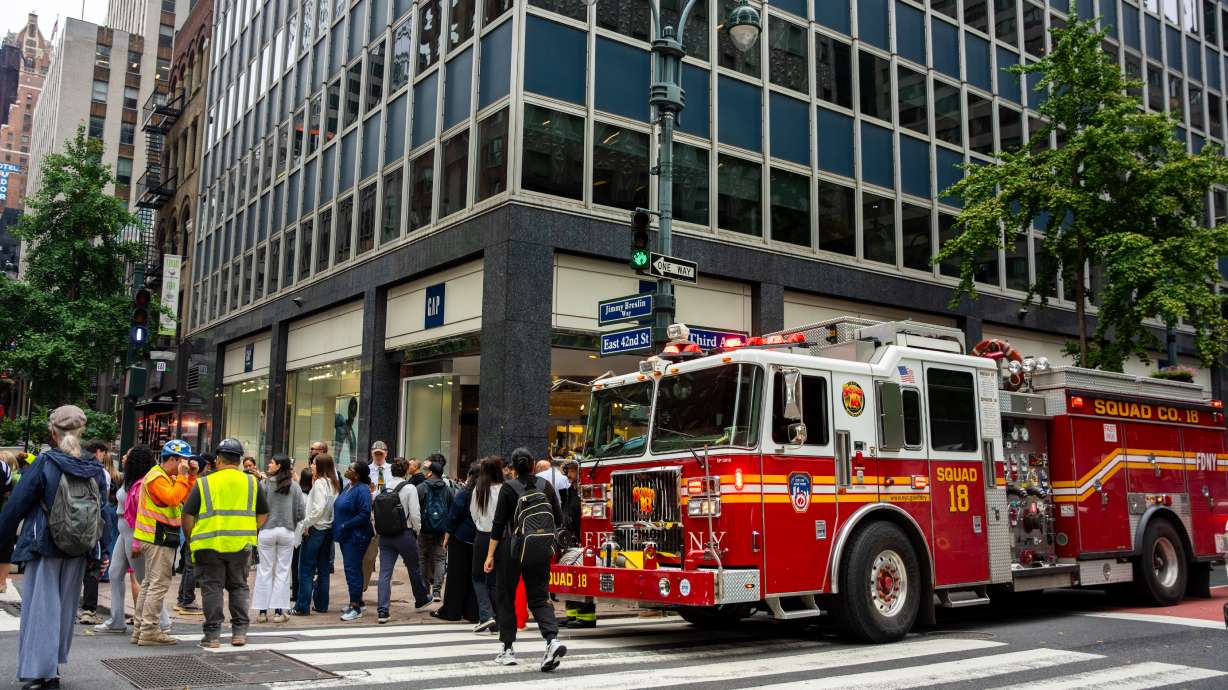 A firetruck is parked at the intersection of 3rd Avenue and East 42nd Street after buildings in the area were evacuated, Tuesday in New York.