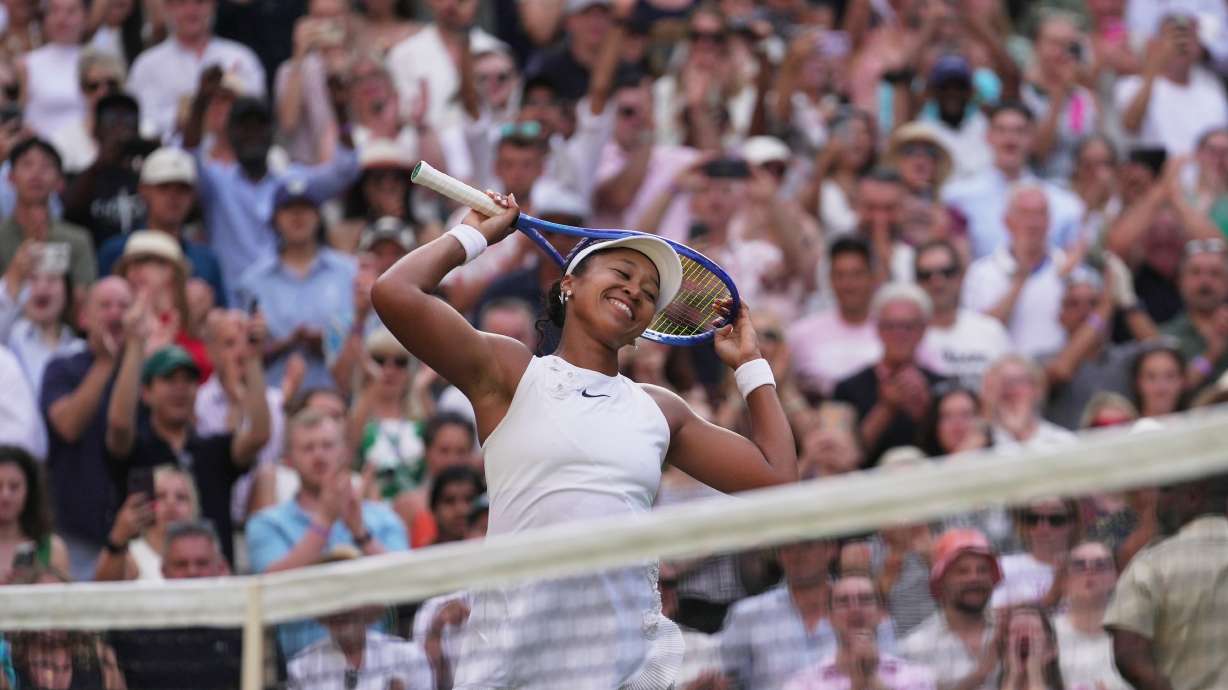 Naomi Osaka of Japan celebrates her victory against Aryna Sabalenka of Belarus in their fourth round women's singles match at the Wimbledon Tennis Championships in London, Sunday, July 5, 2026.