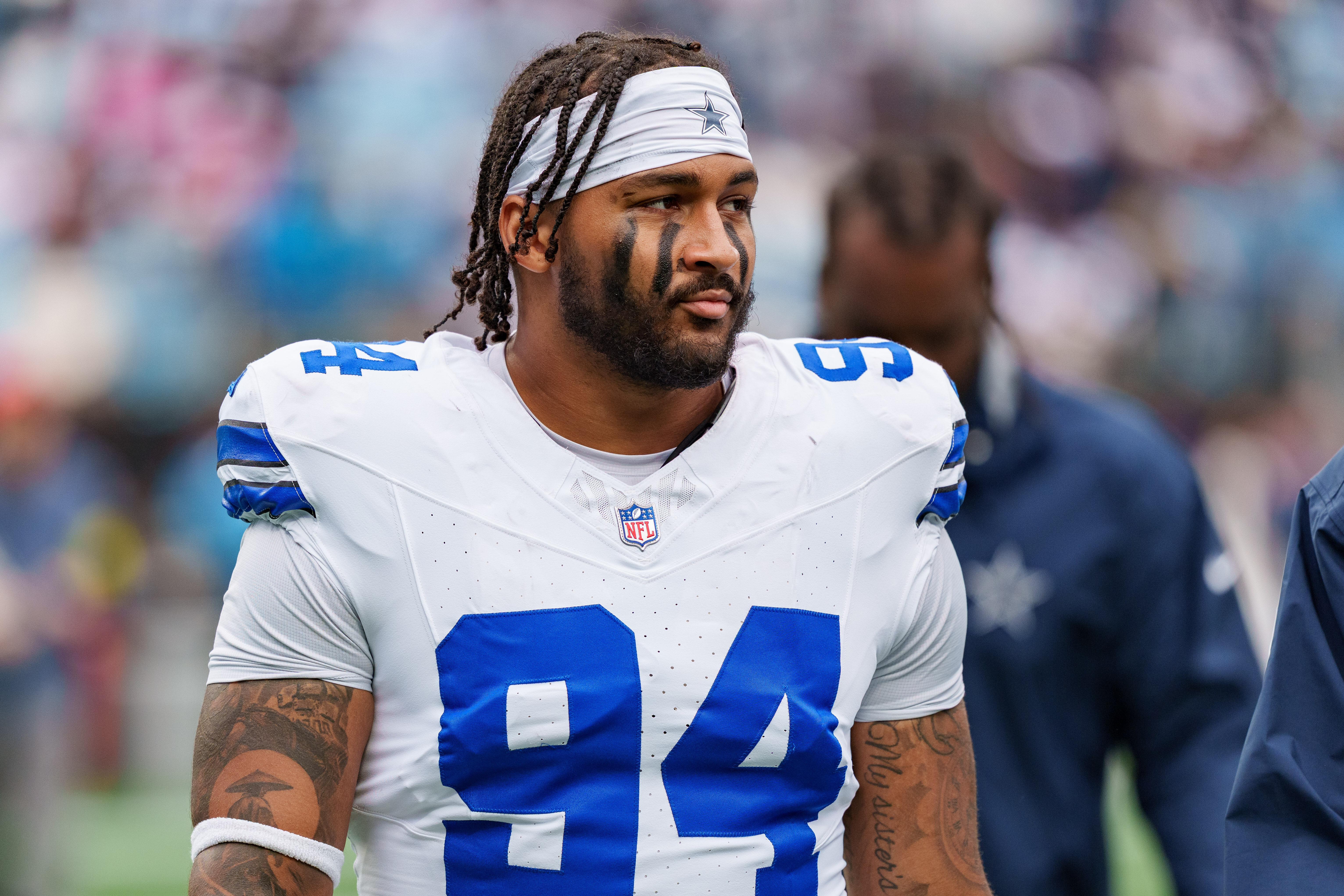 FILE - Dallas Cowboys defensive end Marshawn Kneeland (94) looks on during an NFL football game between the Carolina Panthers and the Dallas Cowboys on Oct. 12, 2025, in Charlotte, N.C. 