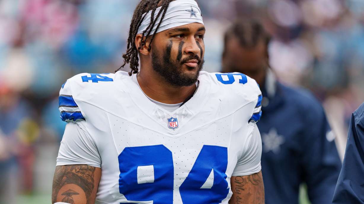 FILE - Dallas Cowboys defensive end Marshawn Kneeland (94) looks on during an NFL football game between the Carolina Panthers and the Dallas Cowboys on Oct. 12, 2025, in Charlotte, N.C.