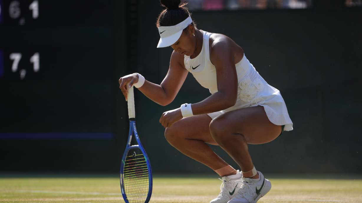 Naomi Osaka of Japan reacts to losing a point against Karolina Muchova of Czech Republic in their quarter-final women's singles match at the Wimbledon Tennis Championships in London, Tuesday, July 7, 2026.