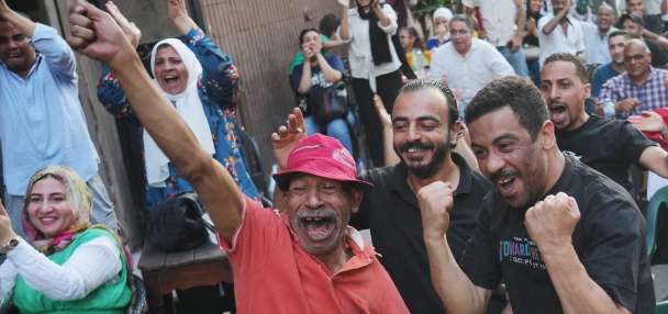 A Cairo coffee house erupts, then goes silent as Egypt's World Cup run meets Argentina