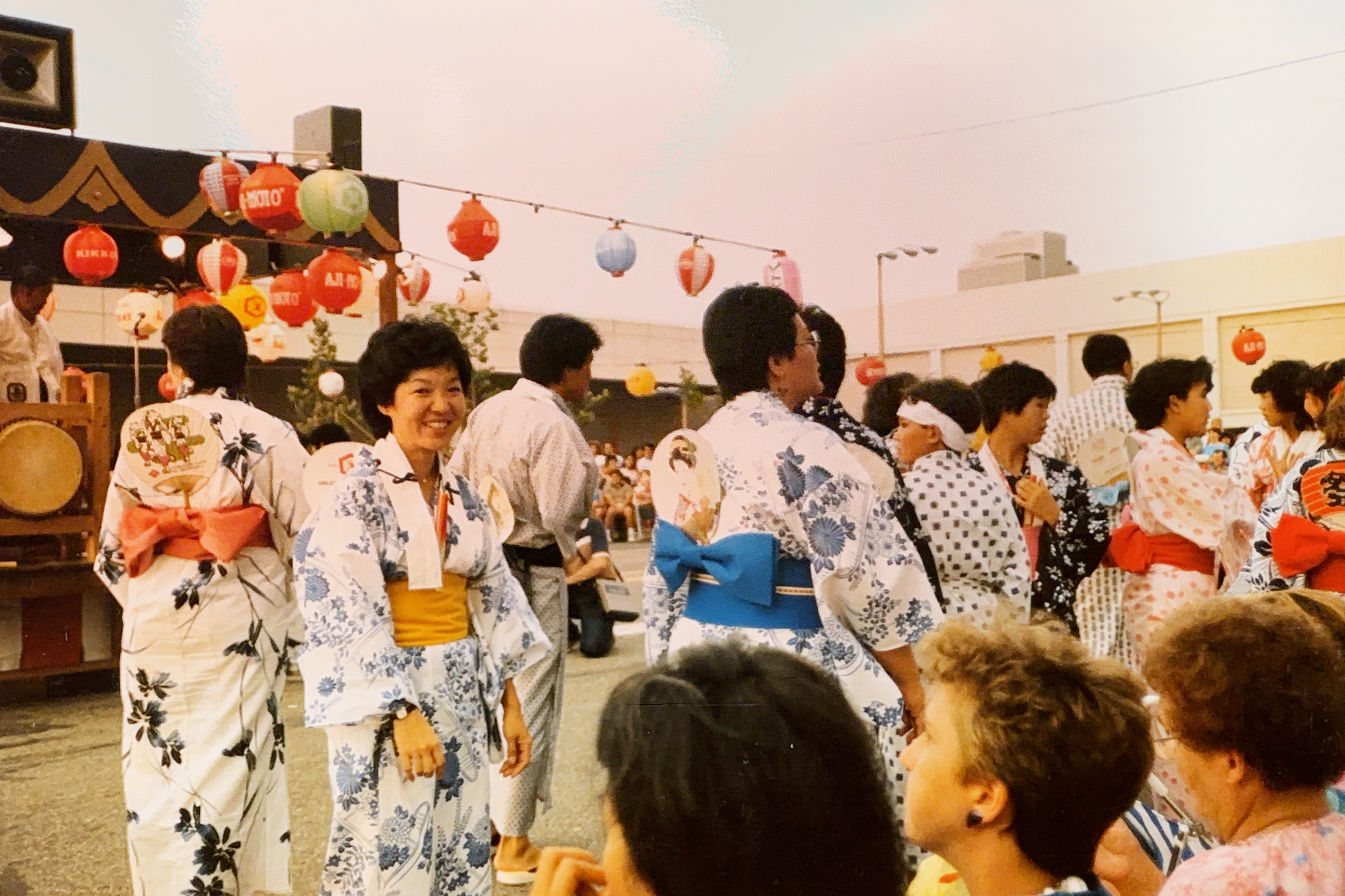 Dancers smile as they perform at the 1994 Obon festival in downtown Salt Lake City.