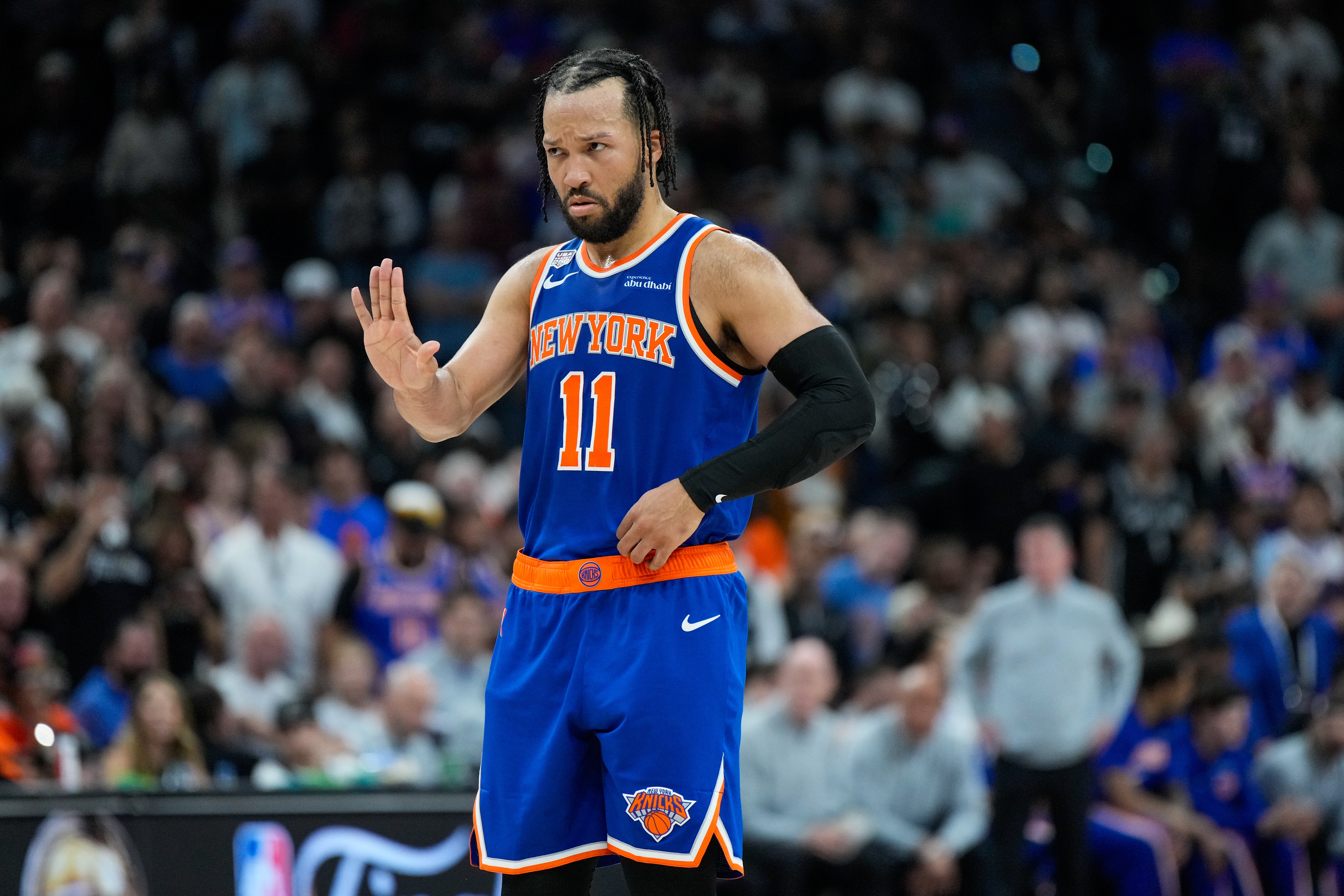 New York Knicks guard Jalen Brunson motions to teammates during the second half of Game 5 of the NBA Finals basketball series against the San Antonio Spurs, Saturday, June 13, 2026, in San Antonio. 