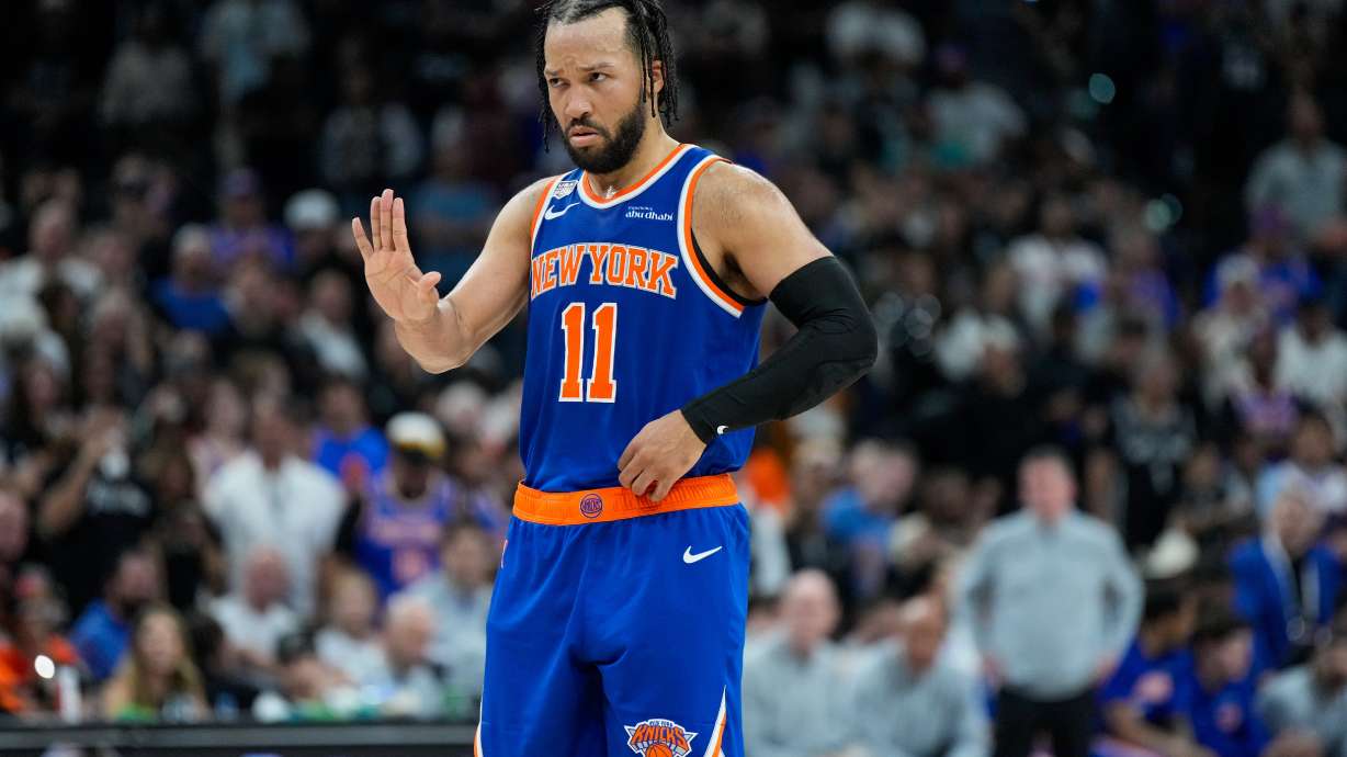 New York Knicks guard Jalen Brunson motions to teammates during the second half of Game 5 of the NBA Finals basketball series against the San Antonio Spurs, Saturday, June 13, 2026, in San Antonio.