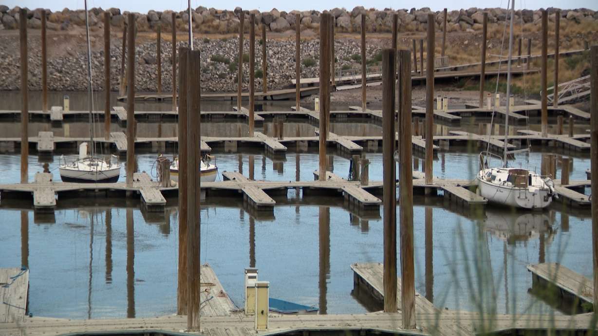 Empty boat slips are pictured at Great Salt Lake Marina on Tuesday. Despite low water levels, a Great Salt Lake tour company is still operating.