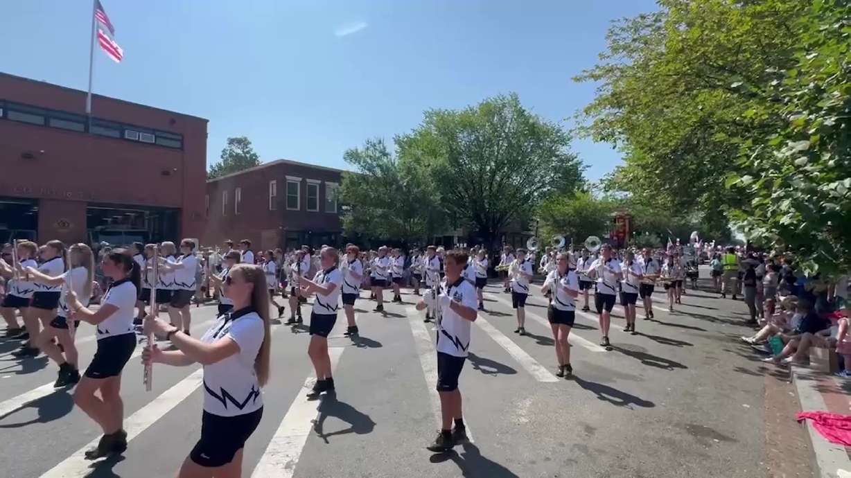 The Farmington High School Marching Band performs in a Fourth of July parade held in Capitol Hill, Washington, on Saturday. The band has quite the story to tell after heading to Washington to perform, which was canceled the night before due to excessive heat.
