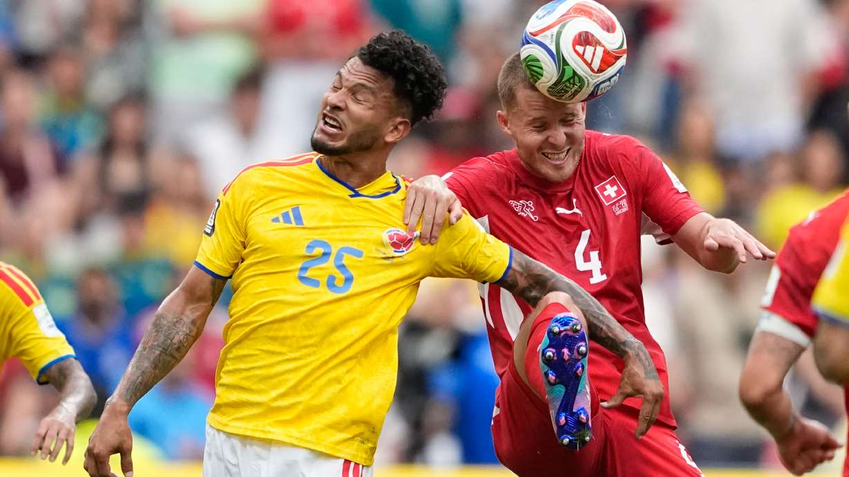 Colombia's Luis Suárez, left, and Switzerland's Nico Elvedi battle for the ball during the World Cup round of 16 soccer match between Switzerland and Colombia in Vancouver, British Columbia, Tuesday, July 7, 2026.