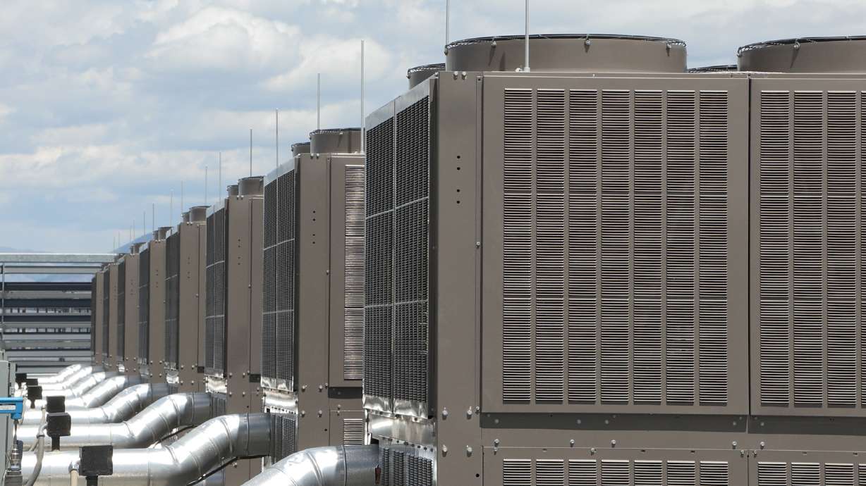 Fans and cooling systems on the roof of Data Bank's SLC5 data center, in Bluffdale. As proposals for new data centers seem to be on the rise, some companies say they are working hard to be good neighbors in their communities.