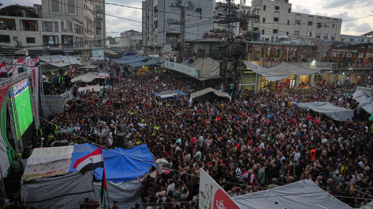 Palestinians watch a live broadcast of the World Cup round of 16 soccer match between Argentina and Egypt in Nuseirat, central Gaza Strip, Tuesday, July 7, 2026.