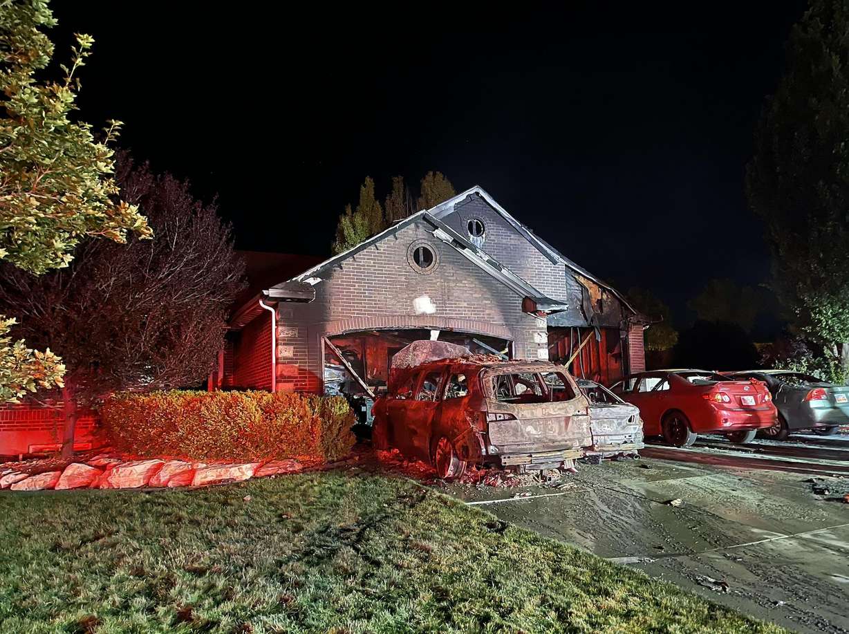 A home in Herriman is pictured after it became engulfed in flames just after midnight on Wednesday.
