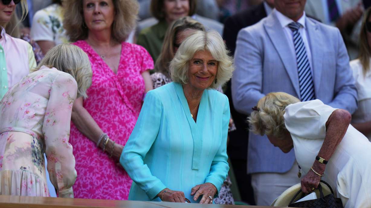 Britain's Queen Camilla arrives to the royal box on day 10 of the Wimbledon Tennis Championships in London, Wednesday, July 8, 2026.