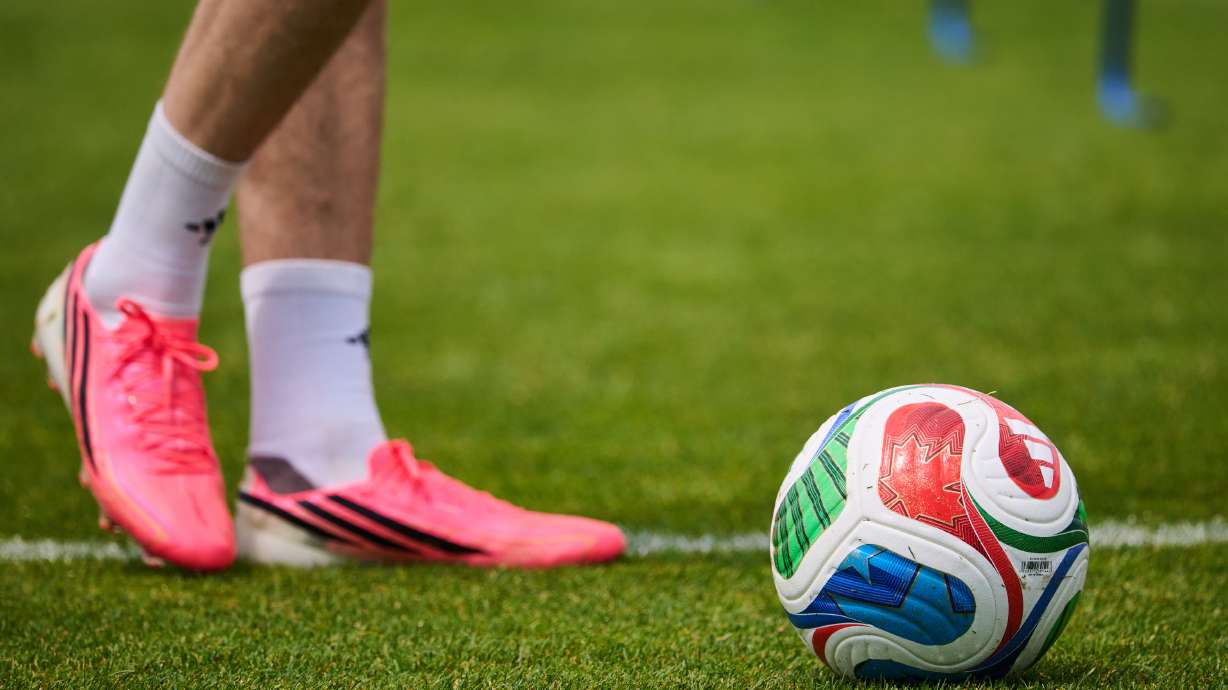 A Canadian flag is seen on a FIFA soccer ball during a World Cup soccer training session in Toronto, Tuesday, June 9, 2026.