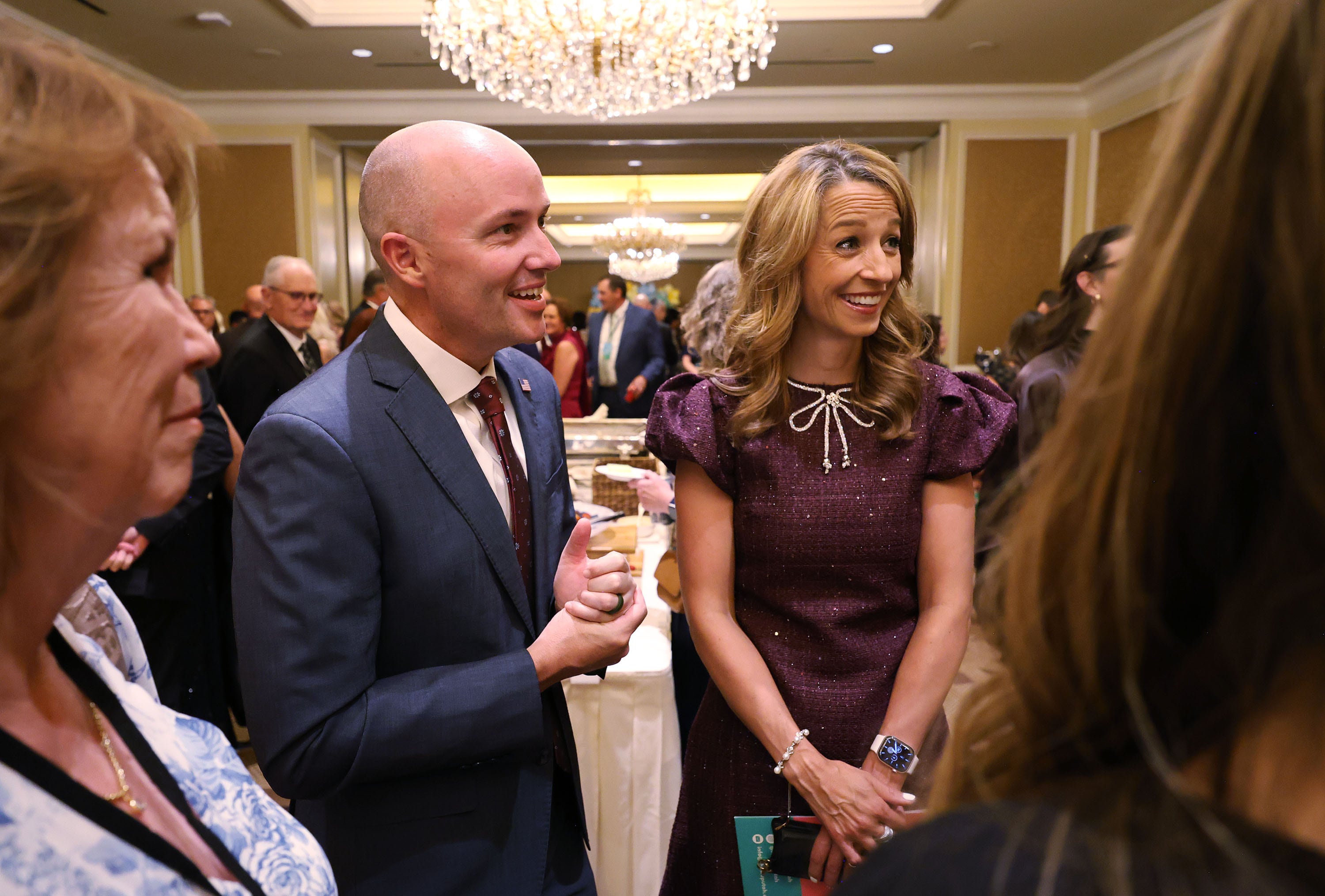 Gov. Spencer Cox and first lady Abby Cox greet attendees during the Honors in Education Gala at Grand America in Salt Lake City on Tuesday.