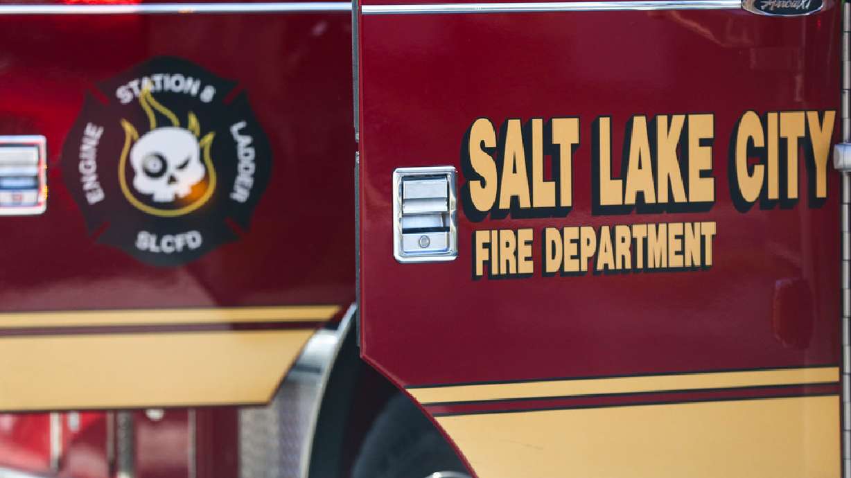 A fire began on Wednesday afternoon, threatening structures in Salt Lake City.
