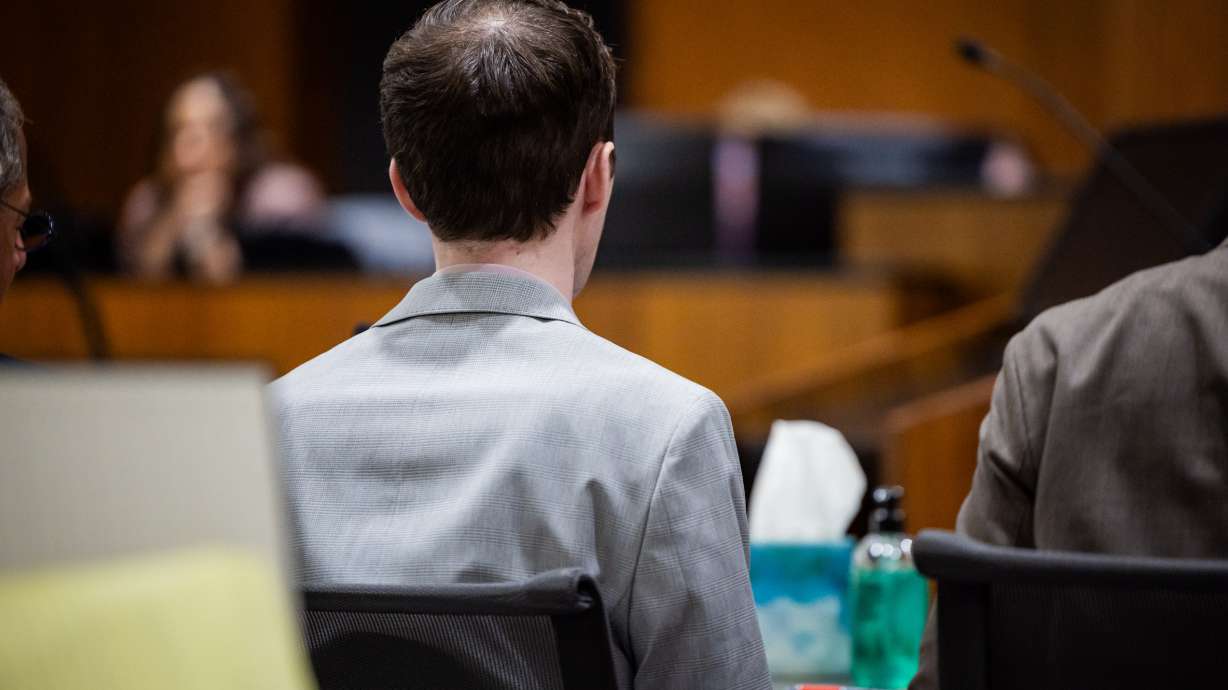 Tyler Robinson, accused in the fatal shooting of Charlie Kirk, listens during a preliminary hearing at the 4th District Court in Provo on July 8. A judge on Tuesday determined Robinson's case will go to trial.