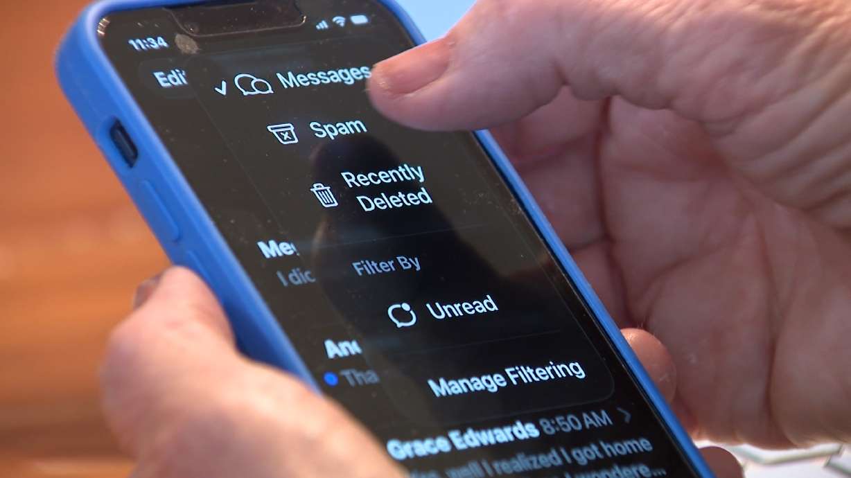 A smartphone shows the hidden spam folder inside the Messages app, where some password-reset codes and verification texts may be filtered.