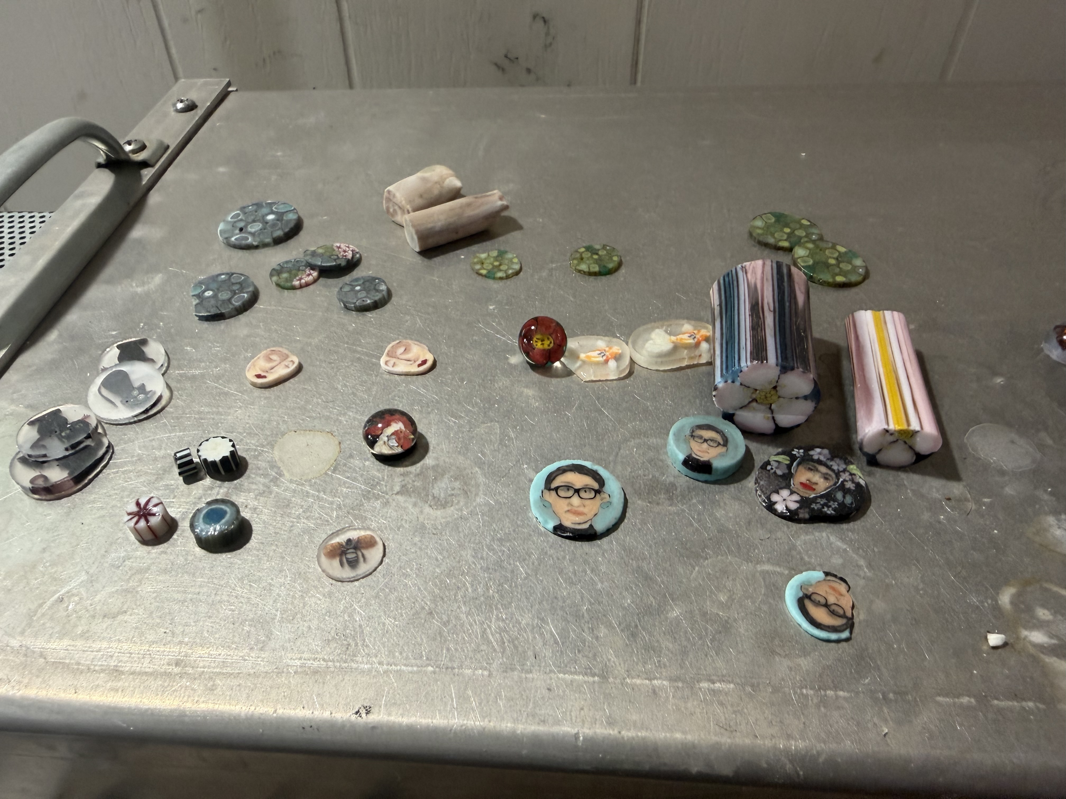 Glass artworks by Jodie McDougall are seen on a work table at the glass artist's home studio in Bountiful on June 24.