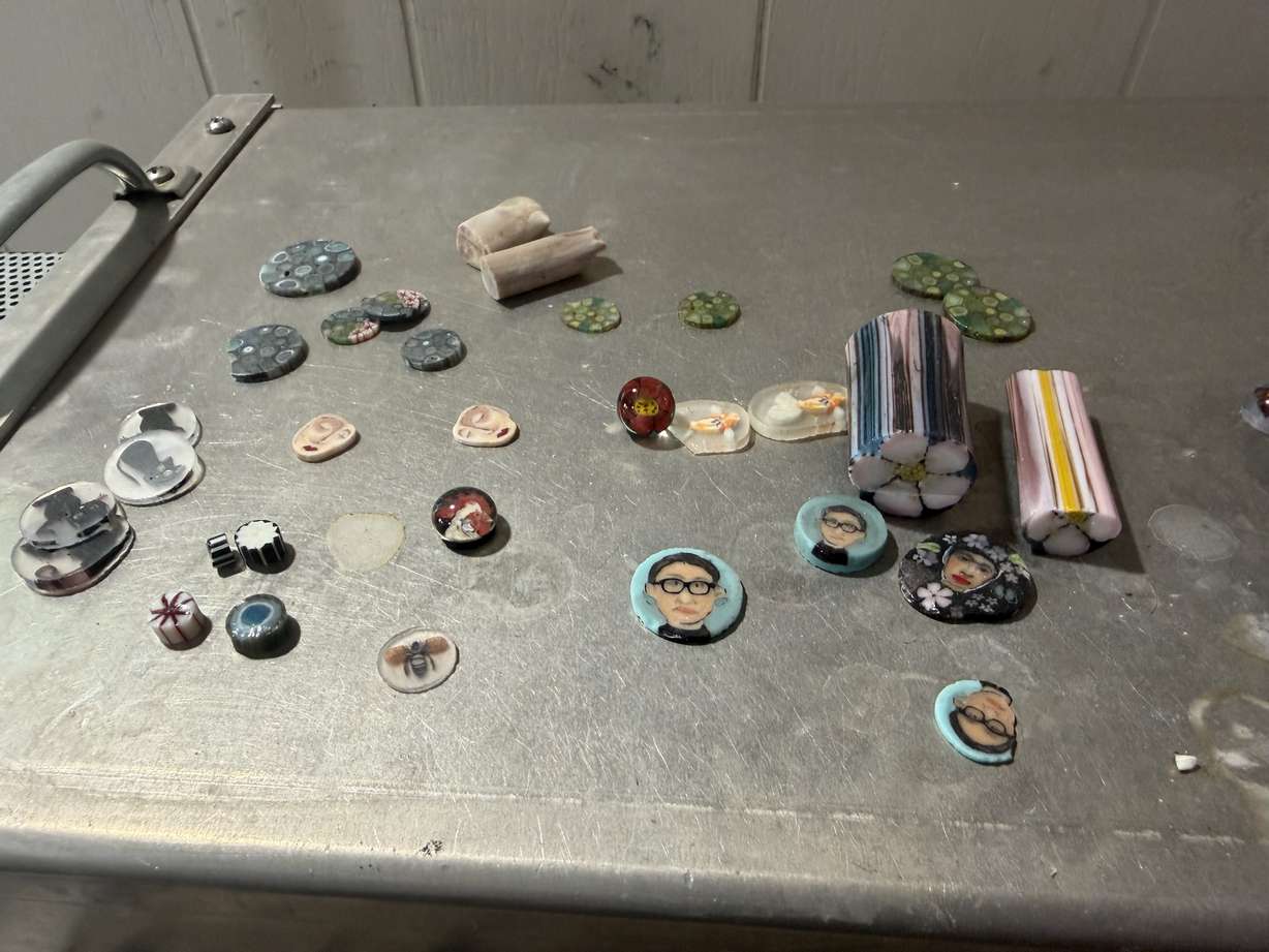 Glass artworks by Jodie McDougall are seen on a work table at the glass artist's home studio in Bountiful on June 24.