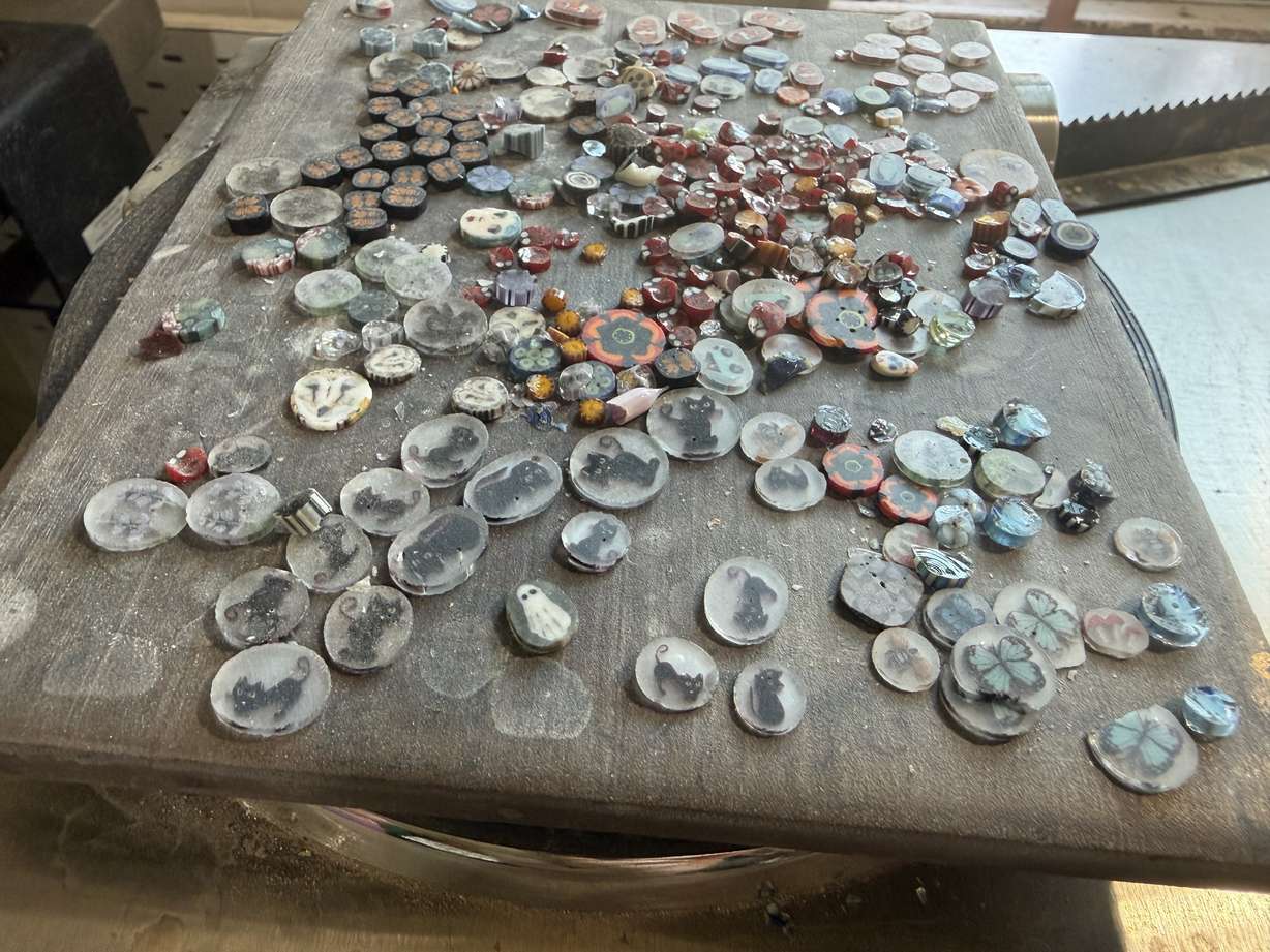 Glass artworks by Jodie McDougall are seen on a work table at the glass artist's home studio in Bountiful on June 24.