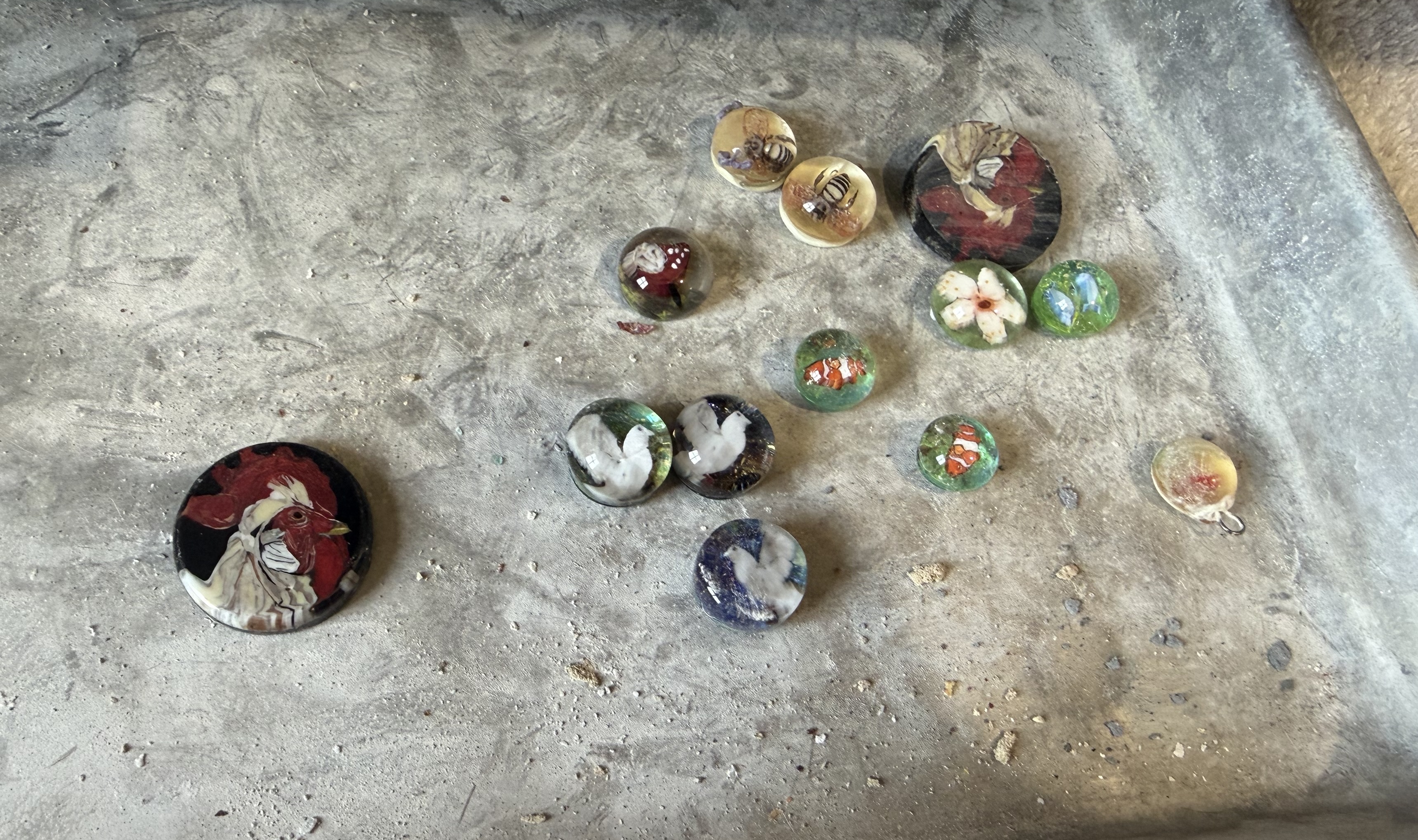 Glass artworks by Jodie McDougall are seen on a work table at the glass artist's home studio in Bountiful on June 24.