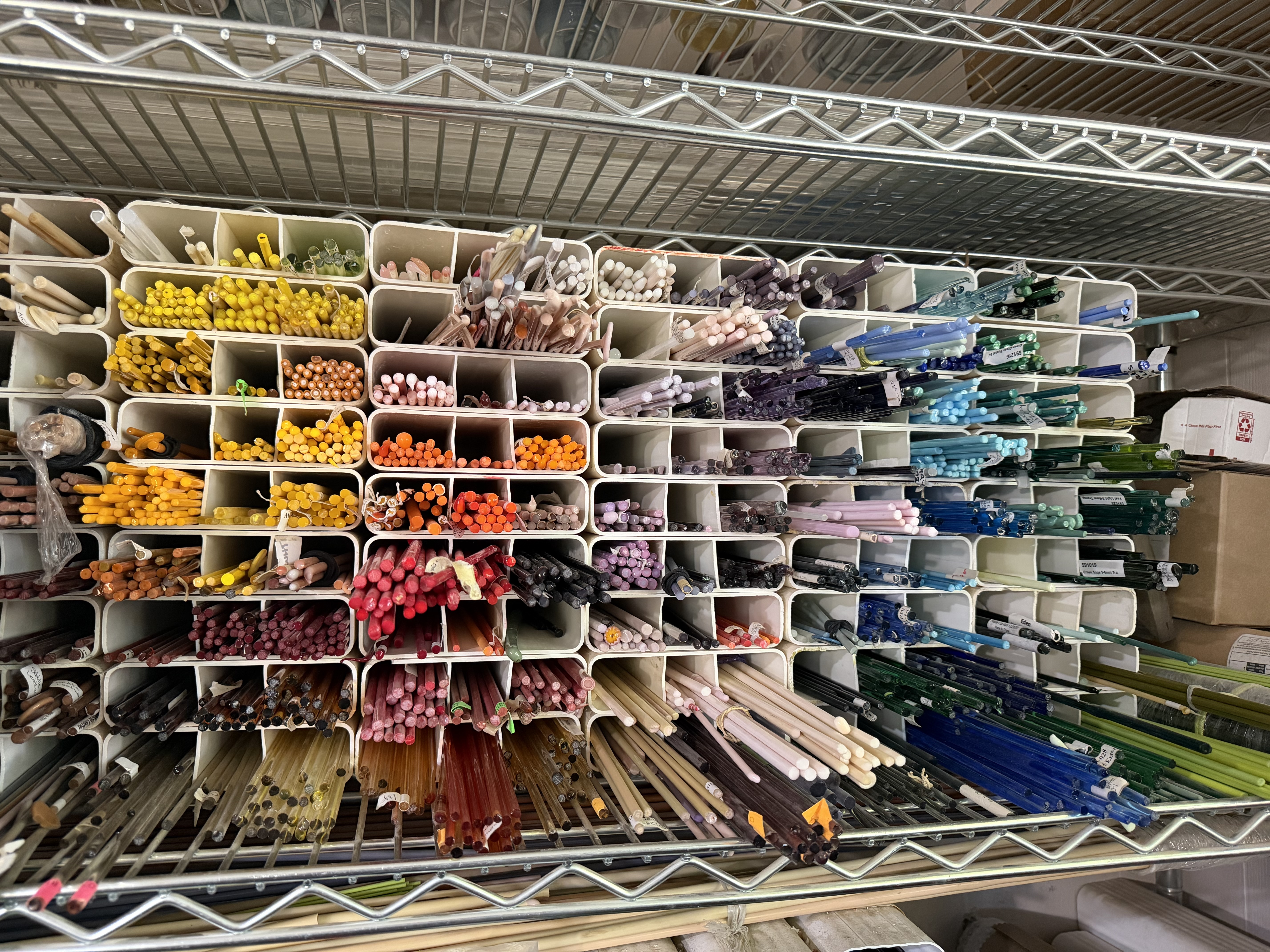 Colorful glass rods stored at Jodie McDougall's home art studio in Bountiful on June 24.