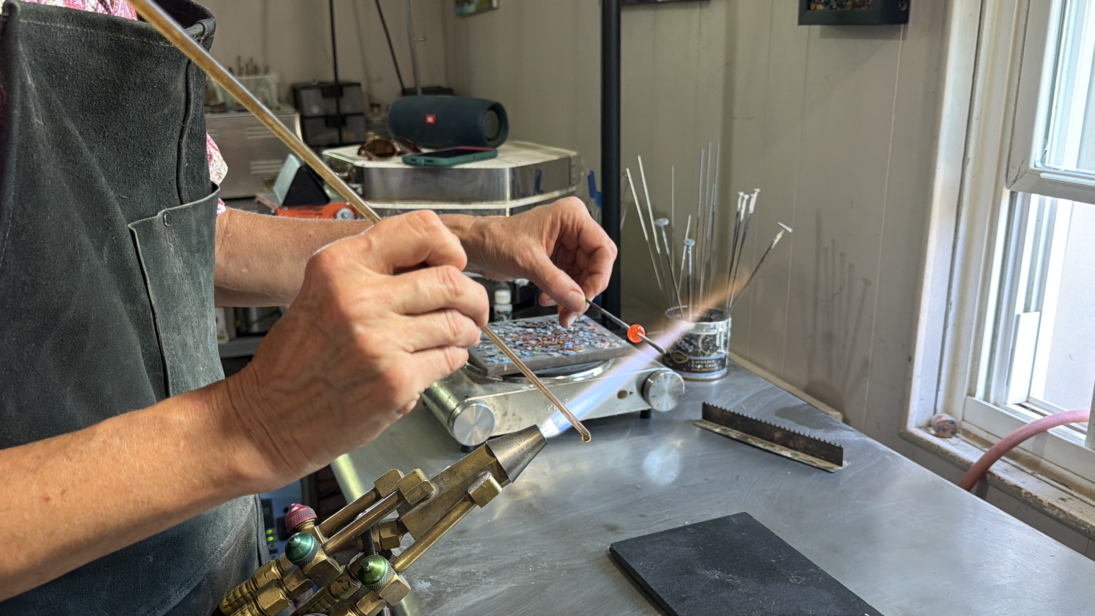 'Miniature worlds in glass': Bountiful glass artist is building community through creating