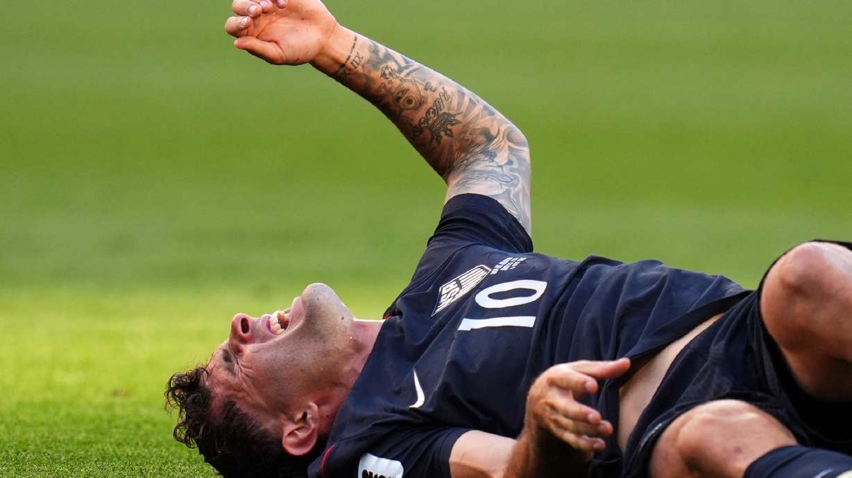 United States' Christian Pulisic (10) reacts after a challenge during the World Cup round of 16 soccer match in Seattle, Monday, July 6, 2026.