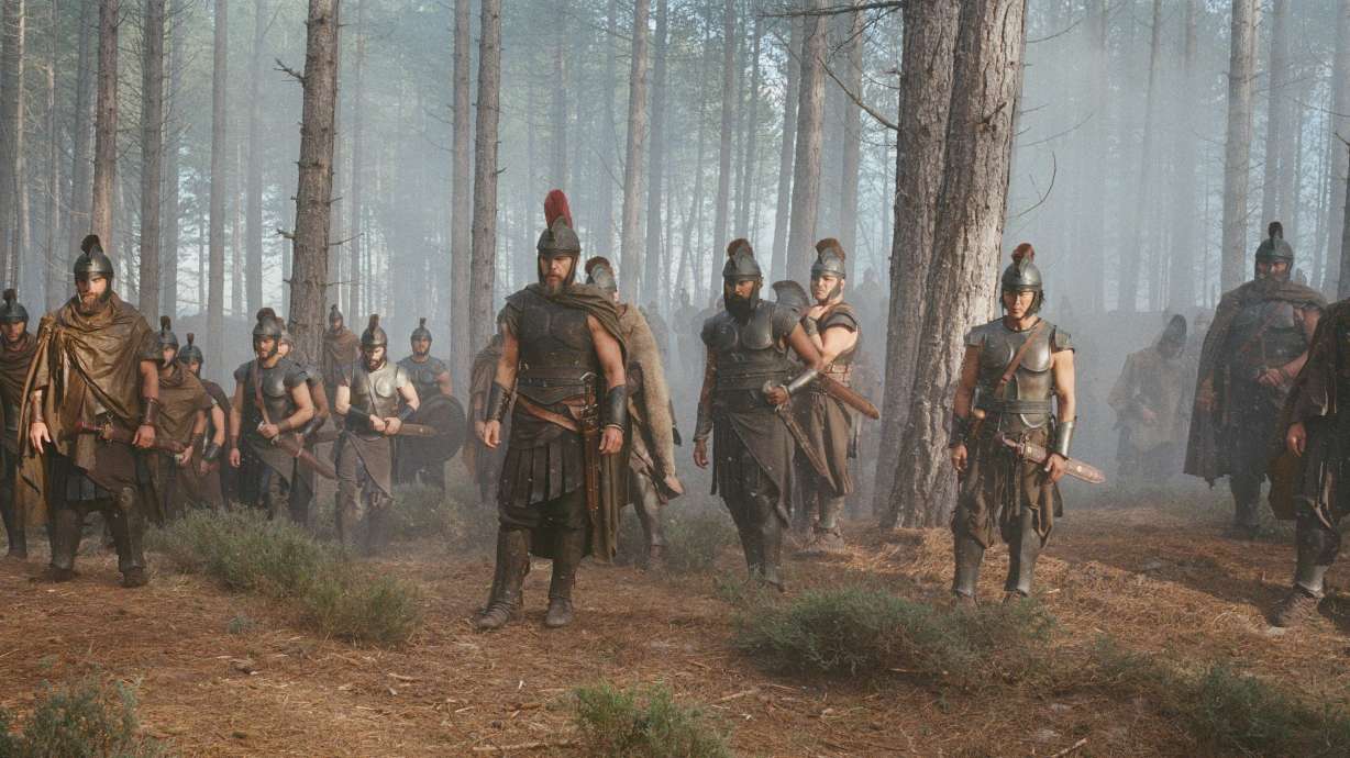 This image released by Universal Pictures shows Matt Damon as Odysseus, center, in a scene from "The Odyssey." Christopher Nolan has never been afraid to dream a little bigger.