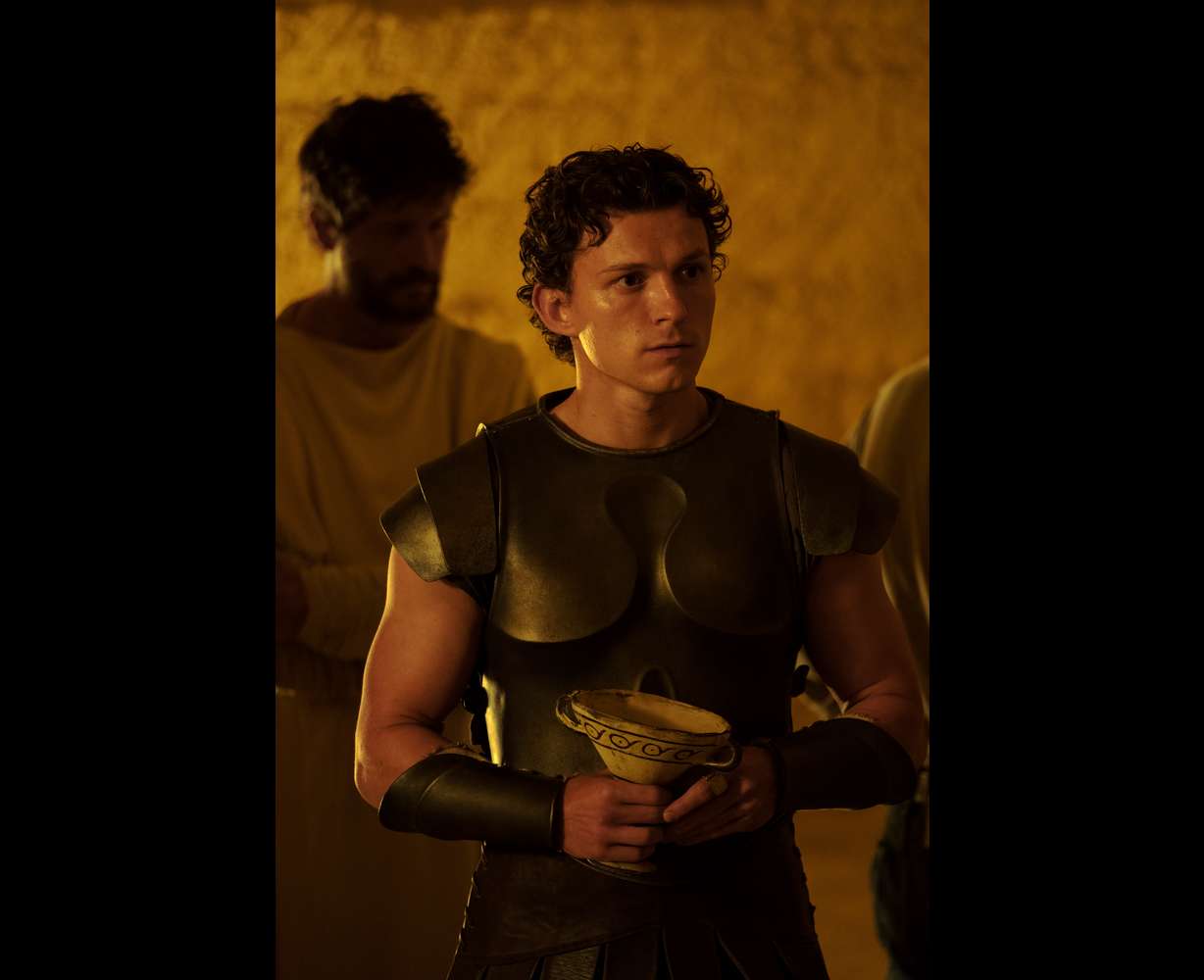 This image released by Universal Pictures shows Tom Holland is Telemachus in a scene from "The Odyssey."