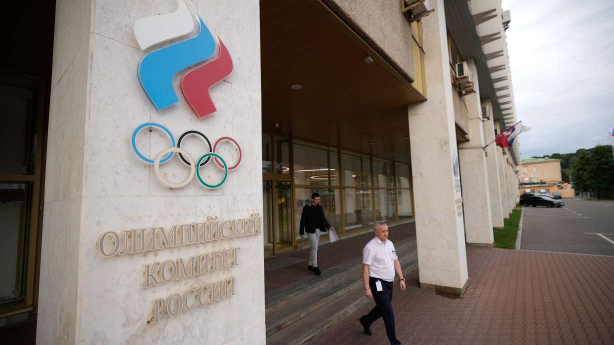 A man walks from the Russian National Olympic Committee building in Moscow, on Tuesday, July 7, 2026.