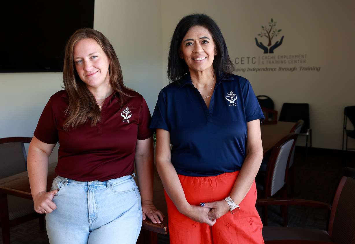 Sarah McIntyre, Cache Employment and Training Center quality inclusion and integration director, and Sandy Smith, executive director, pose for a portrait at the center in Logan on Tuesday.