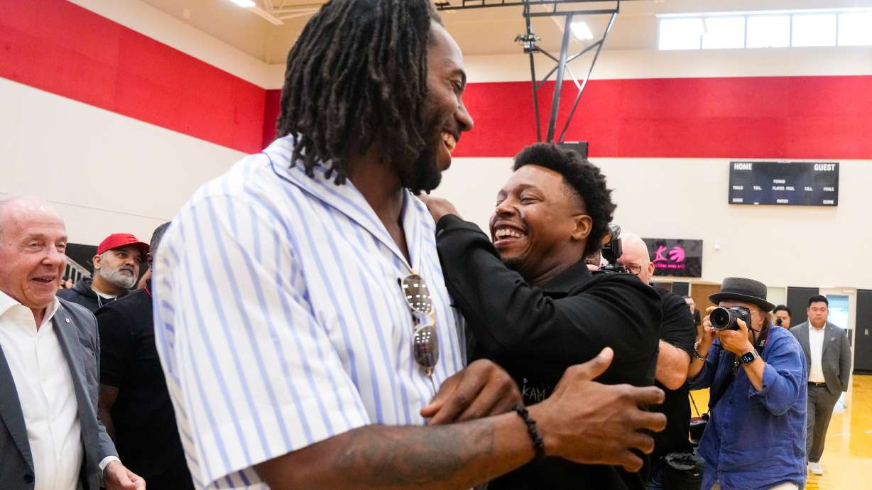 Kyle Lowry, right, speaks with Kawhi Leonard after a press conference in which Lowry signed a one-day contract to retire as a Toronto Raptor, in Toronto, on Tuesday, July 7, 2026.