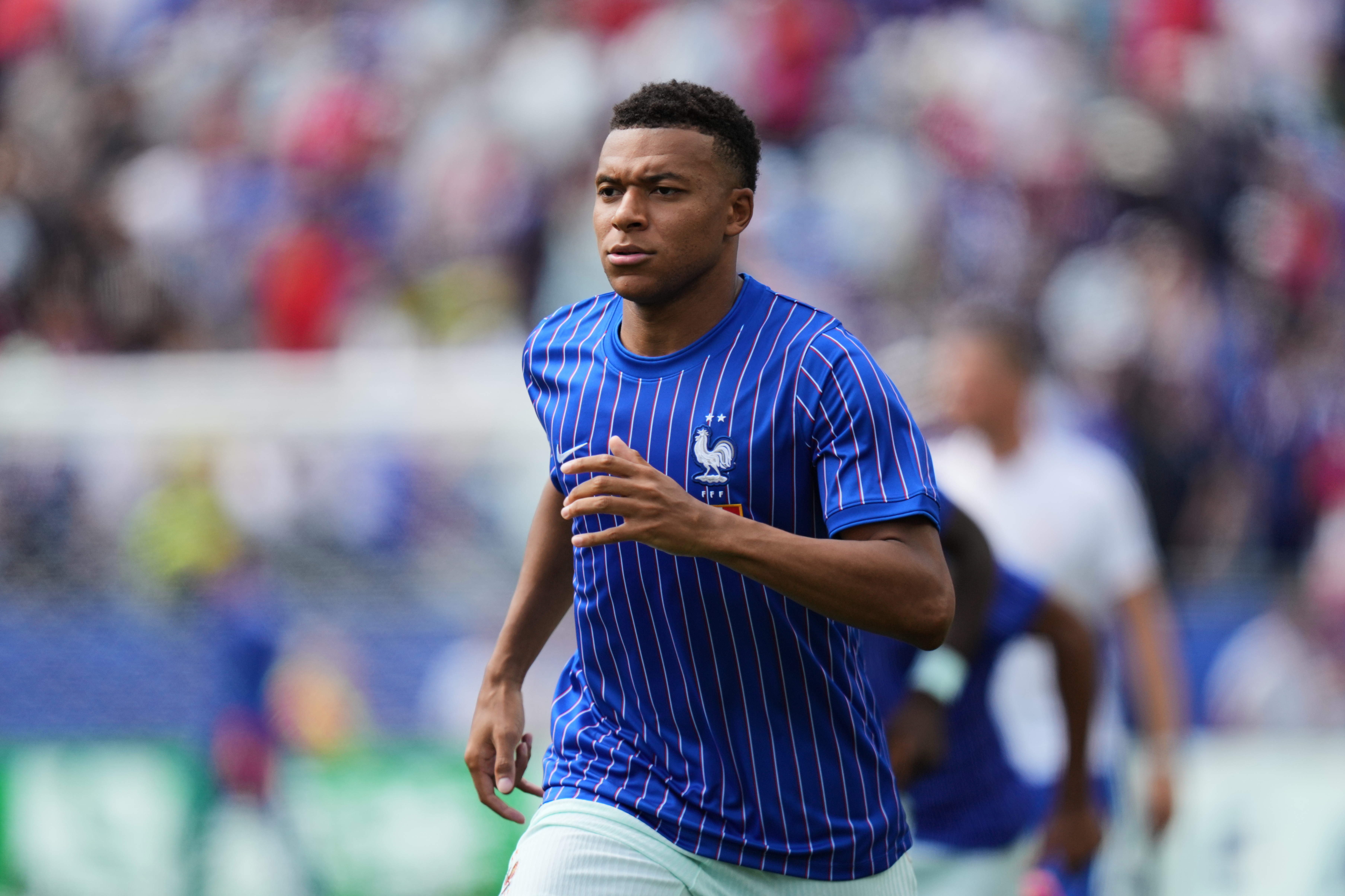 France's Kylian Mbappe warms up before the World Cup quarterfinal soccer match between France and Morocco in Foxborough, Mass., near Boston, Thursday, July 9, 2026. 