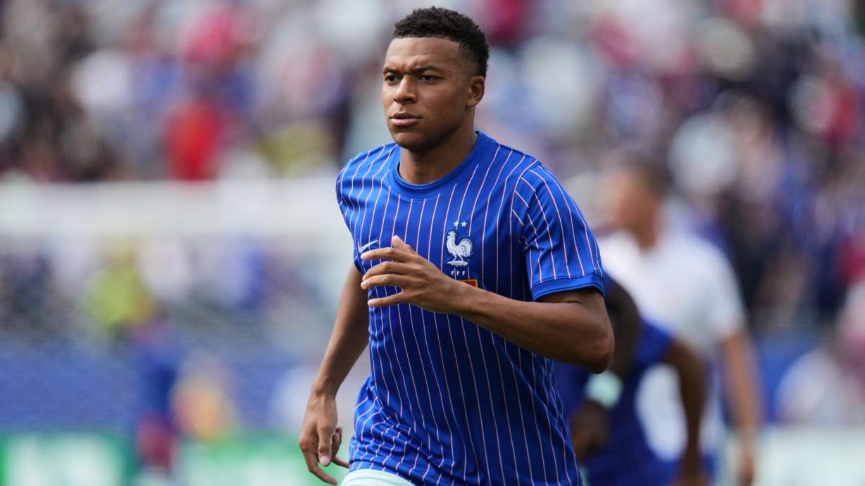 France's Kylian Mbappe warms up before the World Cup quarterfinal soccer match between France and Morocco in Foxborough, Mass., near Boston, Thursday, July 9, 2026.