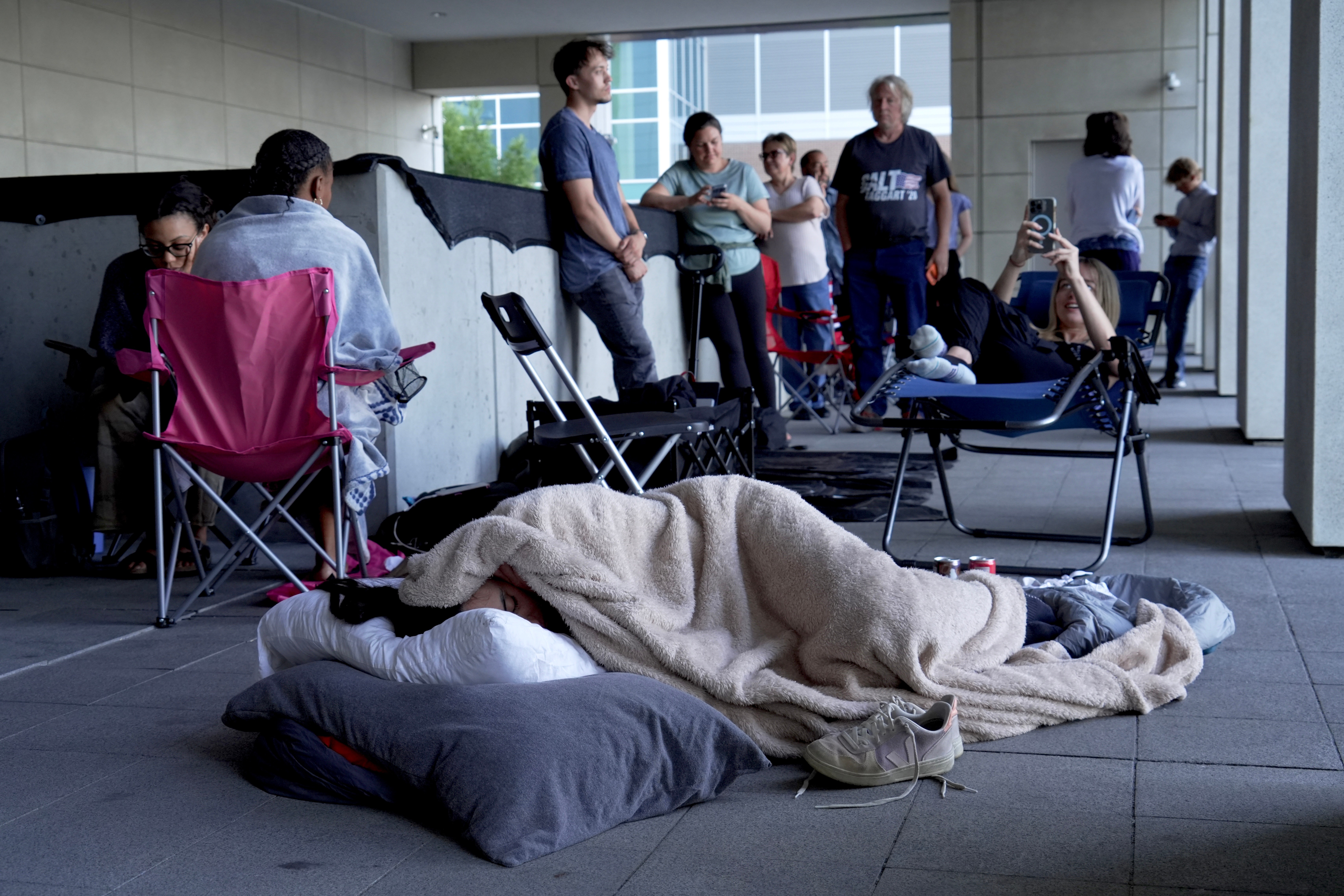 People camp outside court to get scarce public seats in hearing on Charlie Kirk's killing