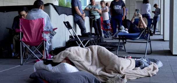 People camp outside court to get scarce public seats in hearing on Charlie Kirk's killing