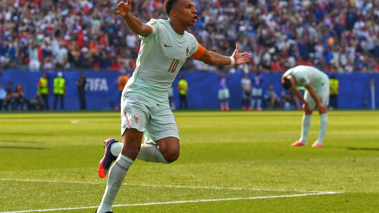 France's Kylian Mbappe (10) celebrates scoring the opening goal during the World Cup quarterfinal soccer match between France and Morocco in Foxborough, Mass., near Boston, Thursday, July 9, 2026.