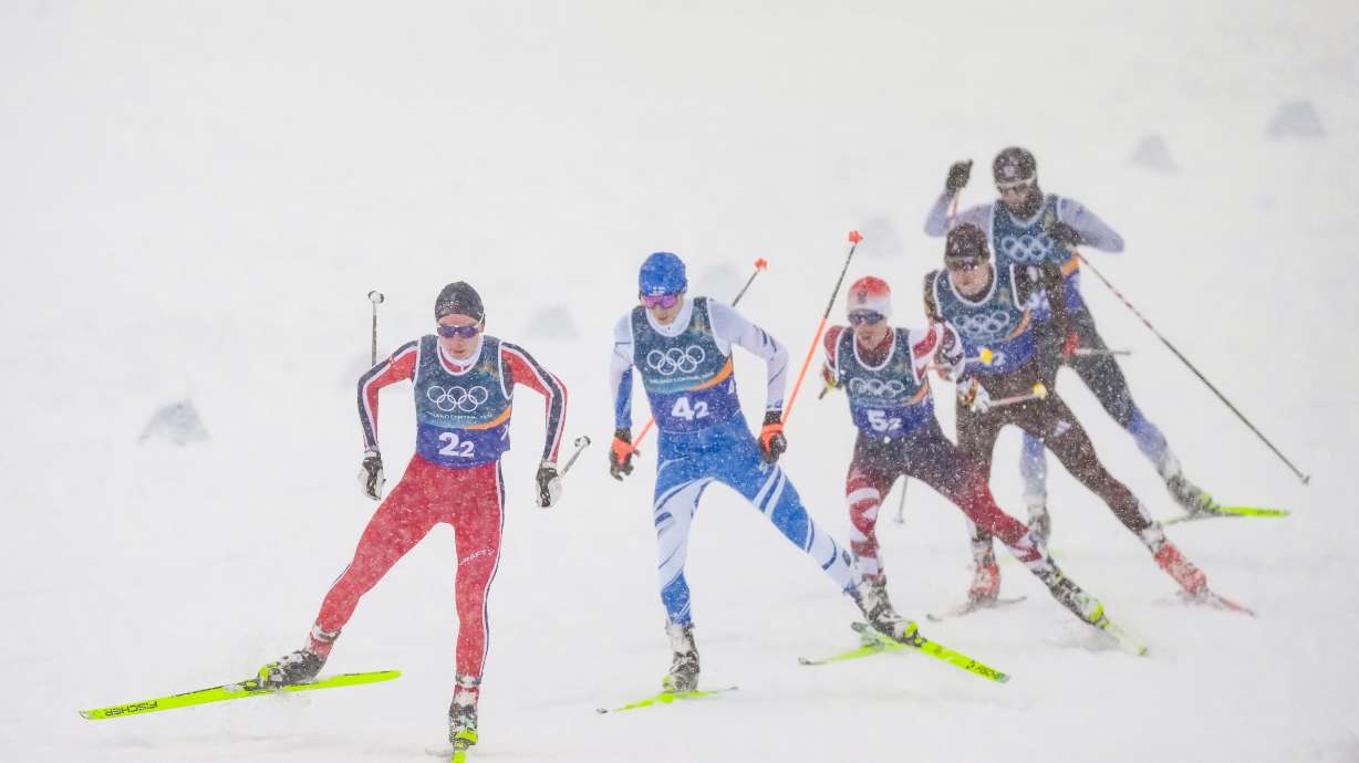 Jens Luraas Oftebro, of Norway, from left, Eero Hirvonen, of Finland, Johannes Lamparter, of Austria, Vinzenz Geiger, of Germany, and Ryota Yamamoto, of Japan, compete in the Nordic combined team sprint at the 2026 Winter Olympics, in Tesero, Italy, Feb. 19.