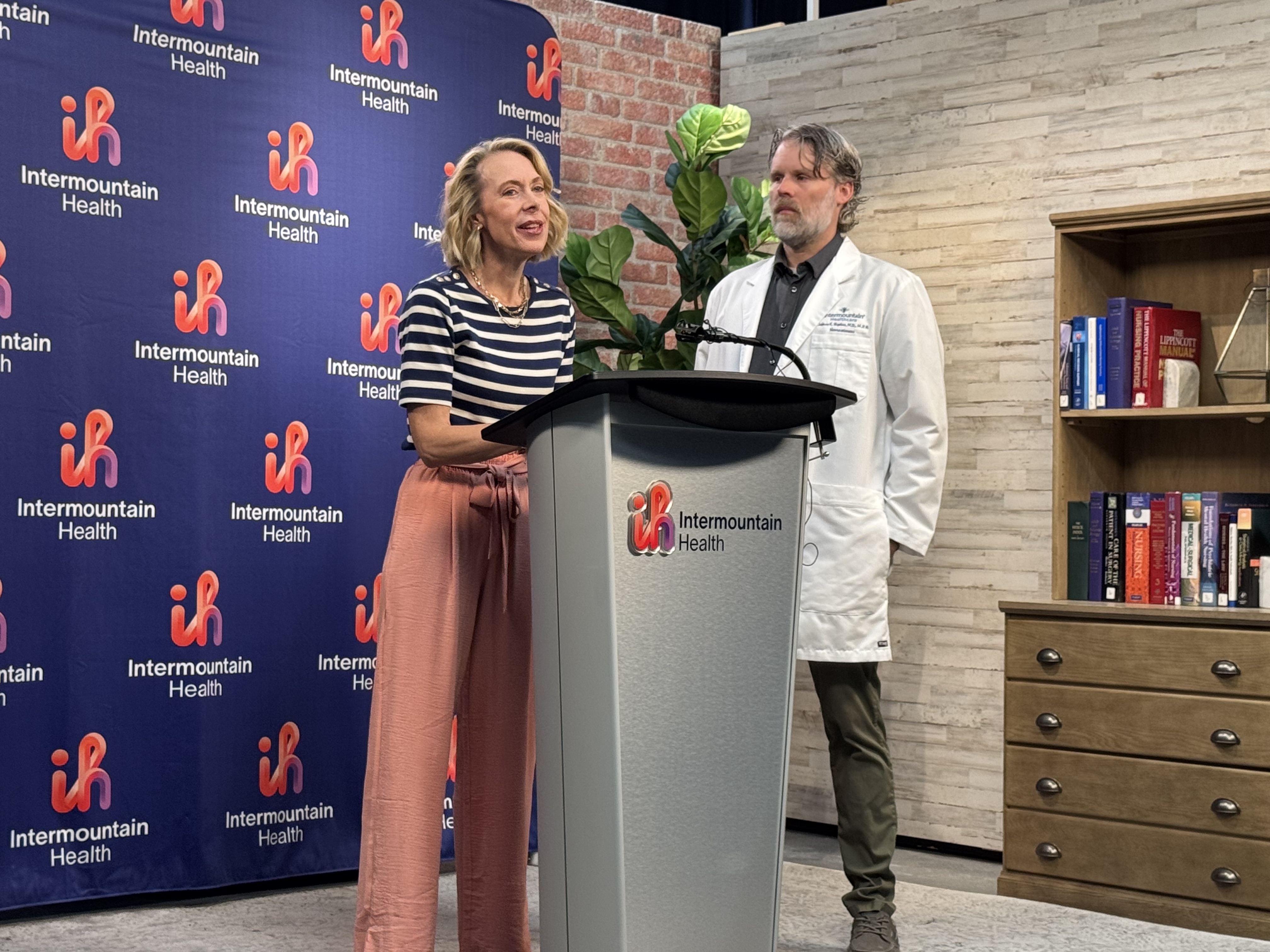 Whitney Wilkinson speaks about a brain implant that helps control her seizures and how it has improved her quality of life at a press conference on Thursday.