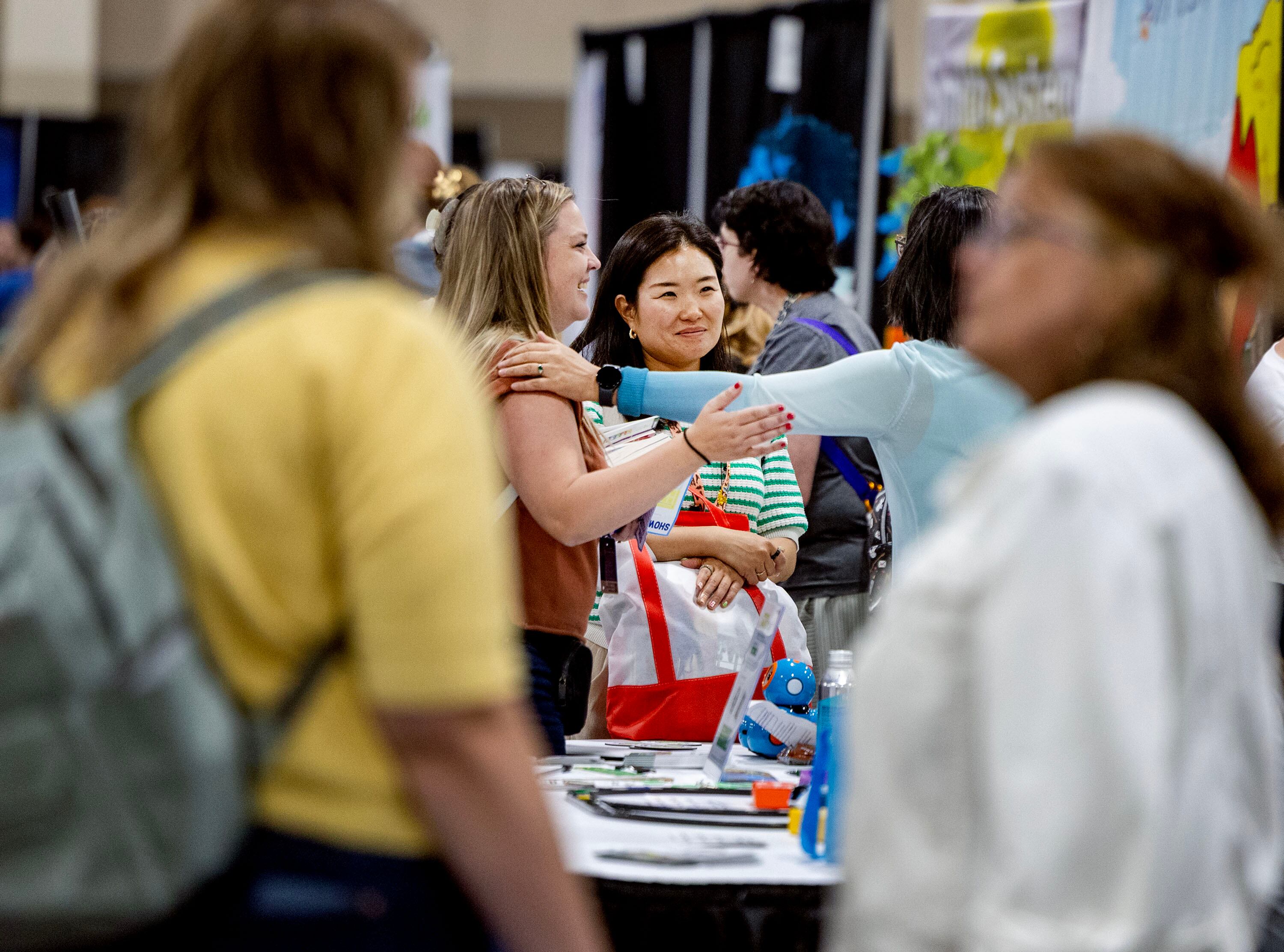 People attend the Show Up for Teachers/Educator Wellness Conference at the Mountain America Exposition Center in Sandy on Thursday.