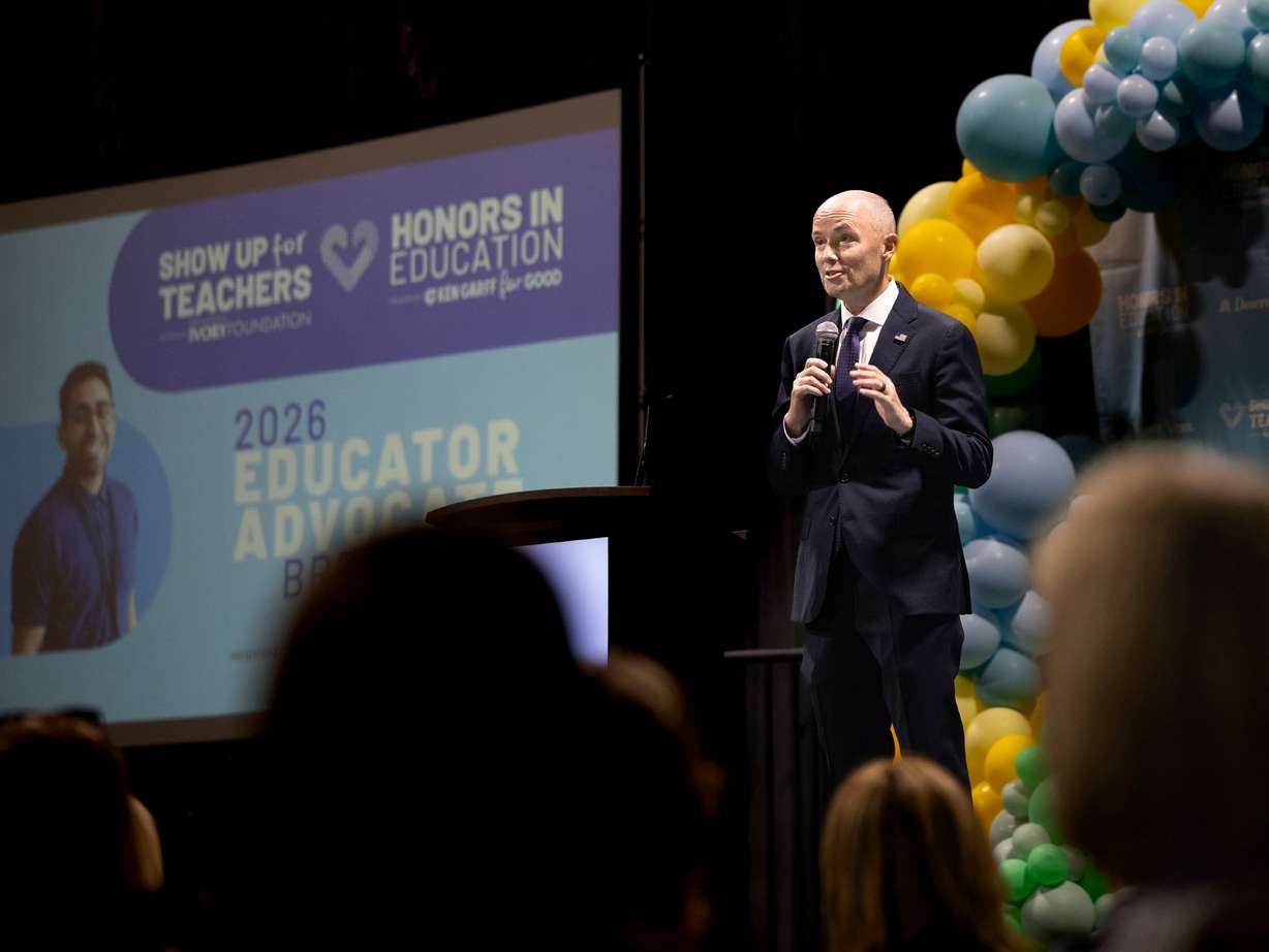 Gov. Spencer Cox speaks at the Show Up for Teachers/Educator Wellness Conference at the Mountain America Exposition Center in Sandy on Thursday.