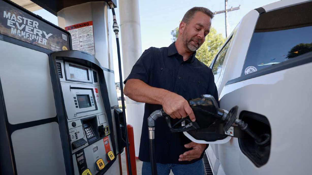 Bryan Jensen gets gas at Shoppers Express in Salt Lake City on June 29.